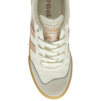 The top-down view of a single white and pink Gola sneaker with laces and a gum sole.