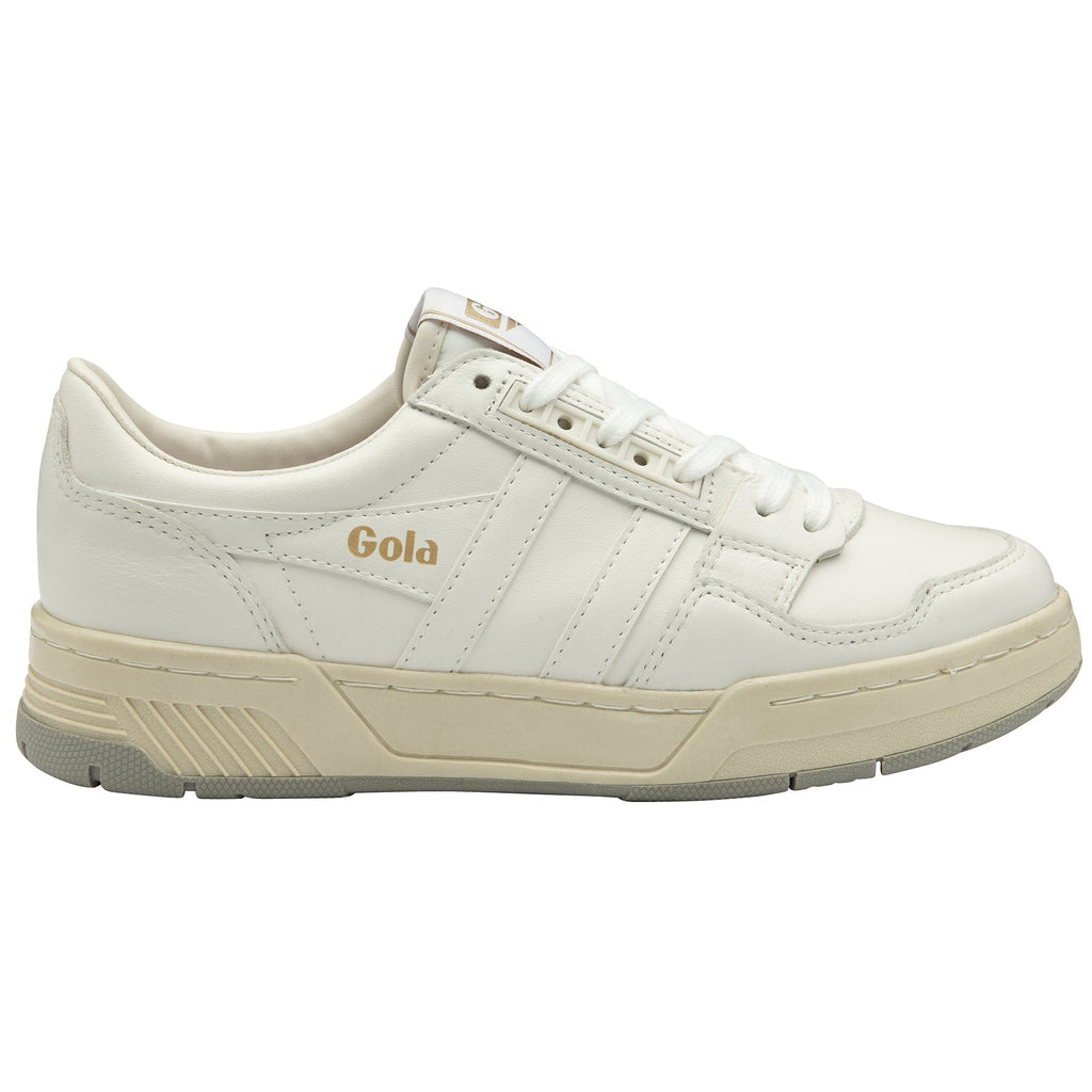 A white Gola sneaker with a beige sole is shown from the side against a white background.
