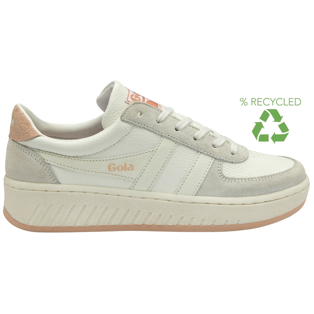 A white Gola sneaker with a blush pink heel and sole, and a green recycled symbol.
