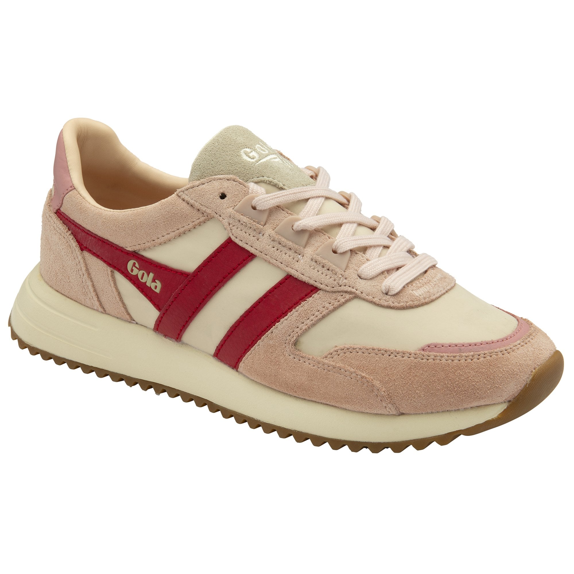 A pale pink sneaker with red stripes on the side, viewed from an angle.
