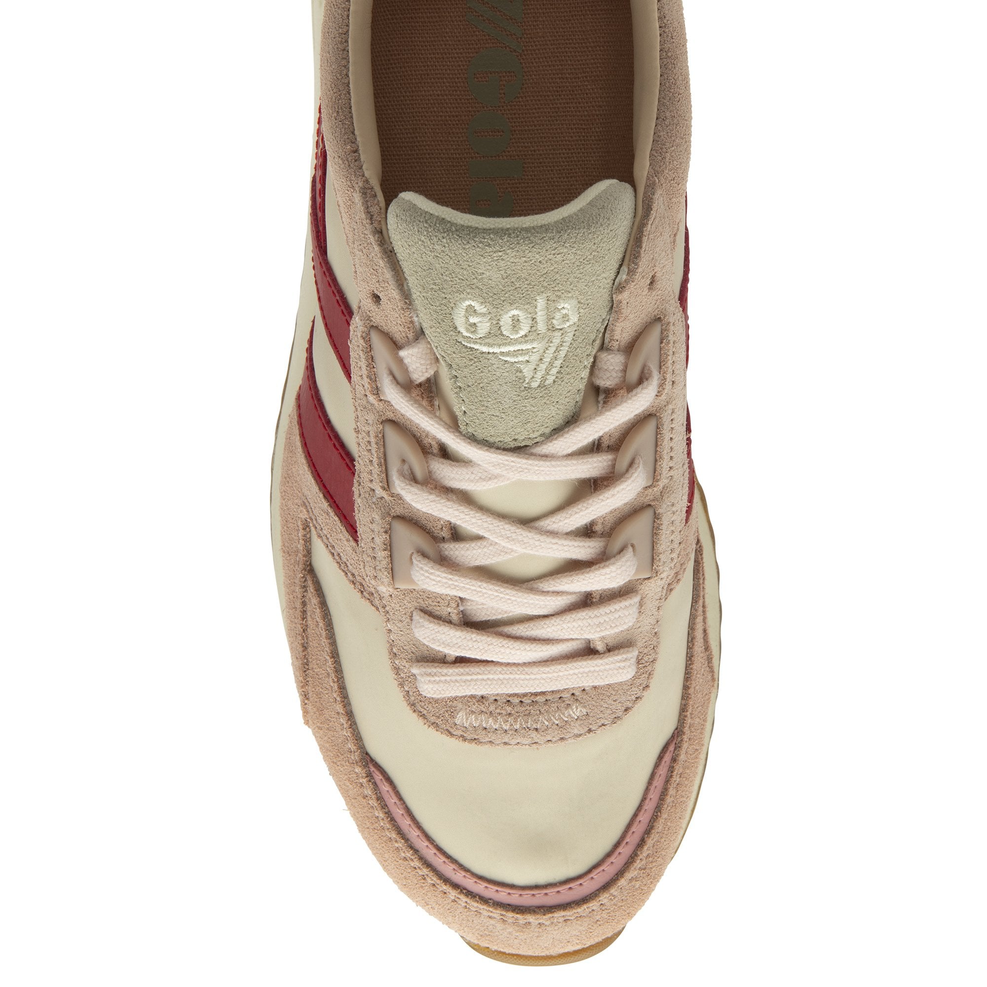 The top-down view of a single pale pink sneaker with red stripes and pink laces.