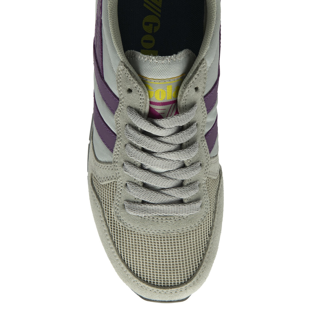 A top-down view of the front of a Gola women's trainer in light grey and purple.