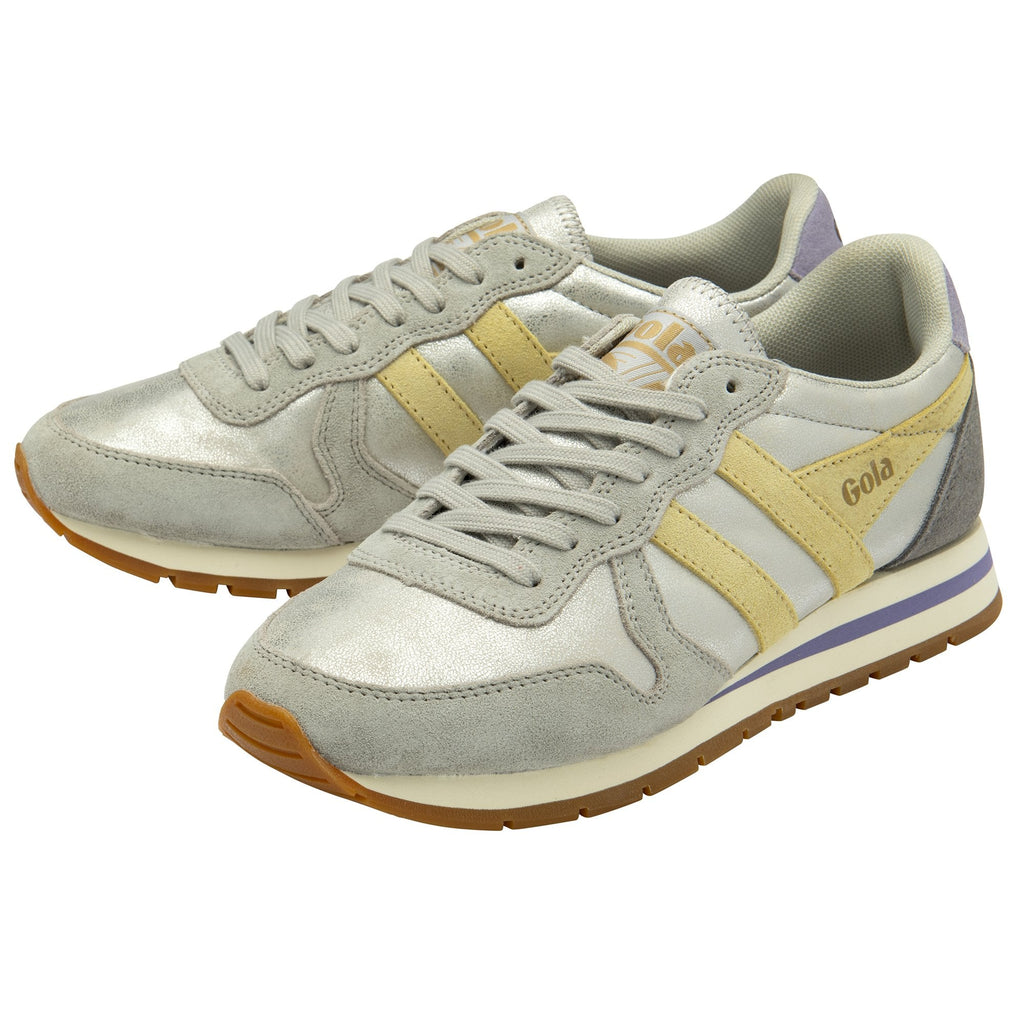 A pair of metallic silver Gola Orchid sneakers with yellow stripes and purple accents.