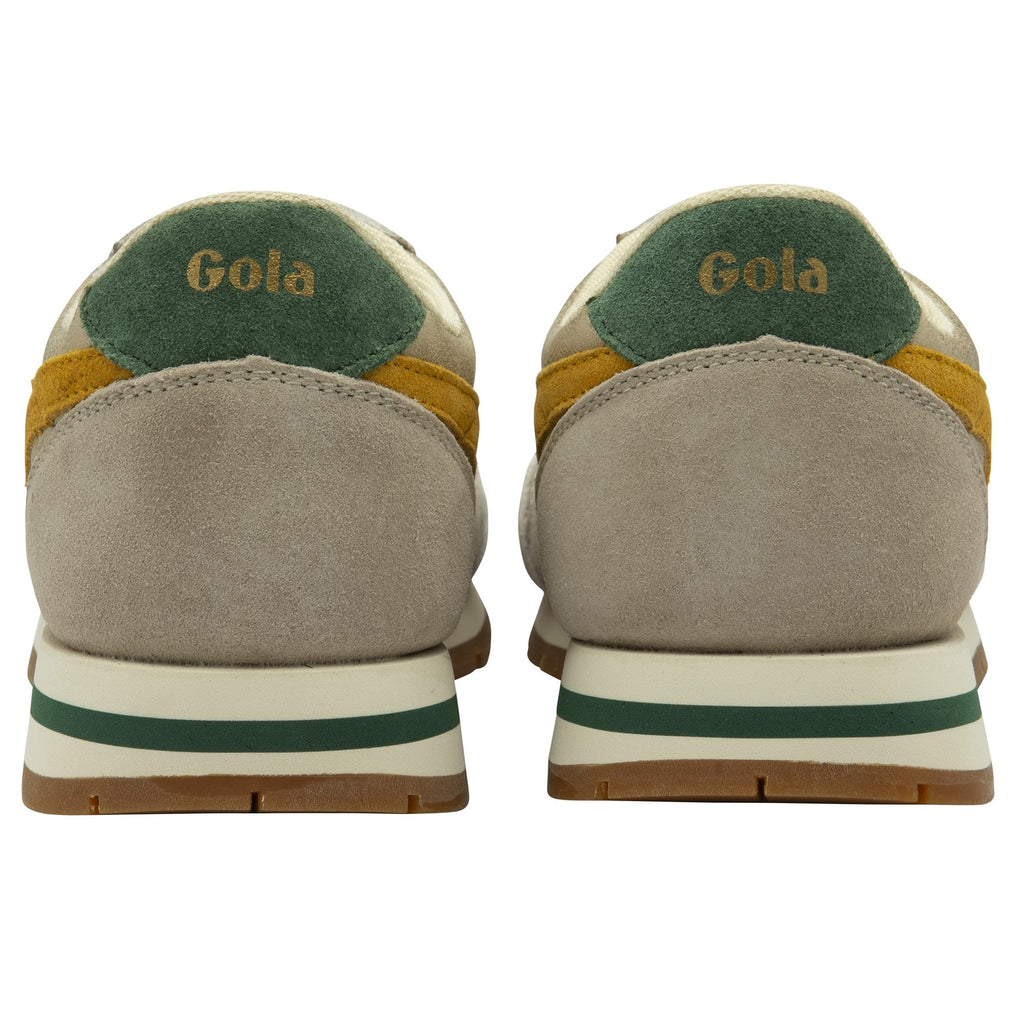 Rear view of a pair of Gola women's trainers with gold and mustard stripes on a white background.