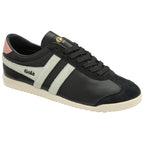 Black Gola Bullet trainers with white stripes and a pink heel tab, side view.