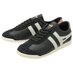 Pair of black Gola Bullet trainers with white stripes and pink heel tabs.