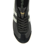 Top-down view of a black Gola Bullet trainer with white stripes and black laces.