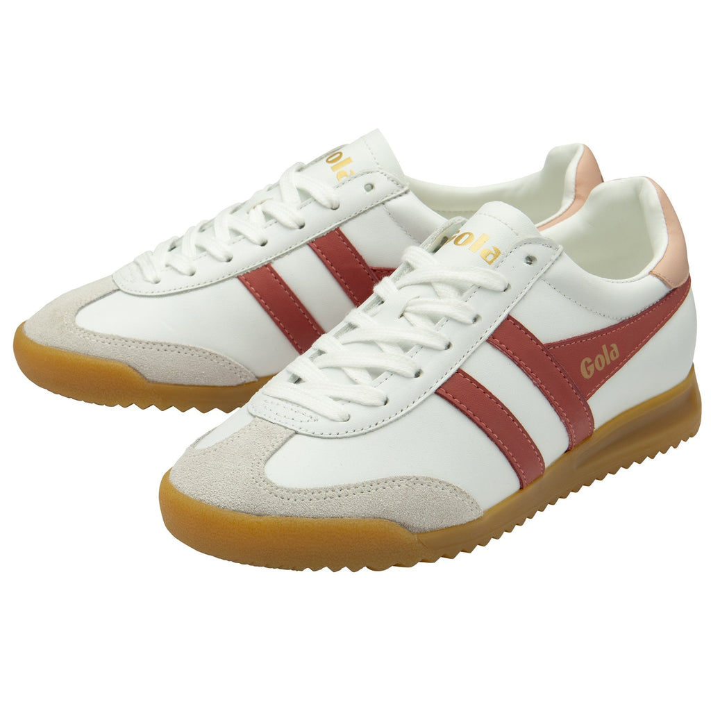 Pair of white and red Gola sneakers with gum soles.