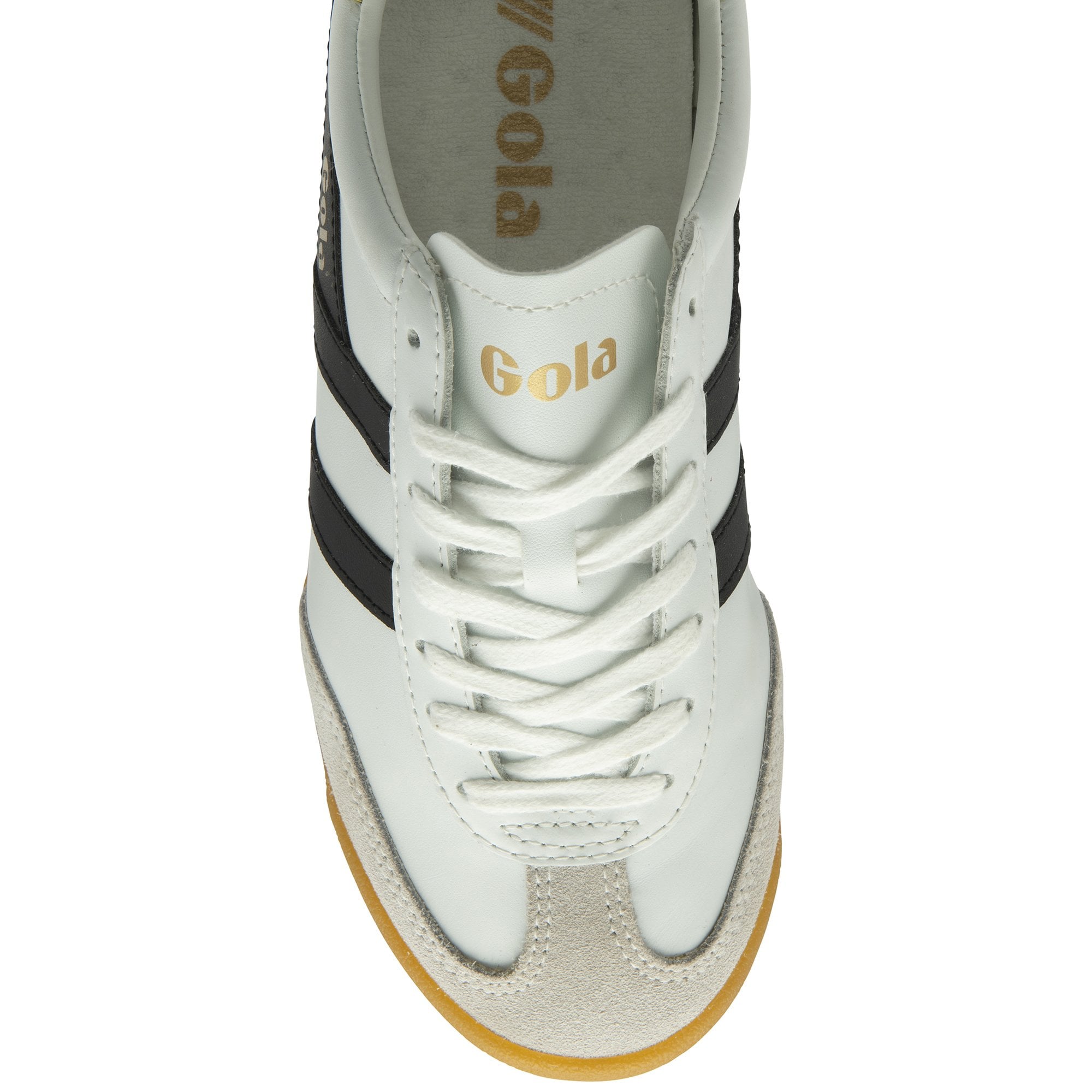 An overhead view of a white Gola sneaker with black stripes and gold branding.
