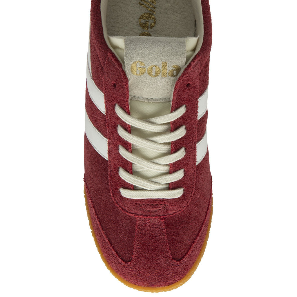 Top-down view of a single maroon Gola sneaker with white stripes and cream laces.
