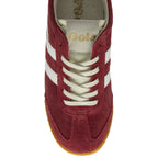 Top-down view of a single maroon Gola sneaker with white stripes and cream laces.