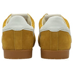 Back view of a pair of yellow Gola sneakers with white heel accents and gum soles.