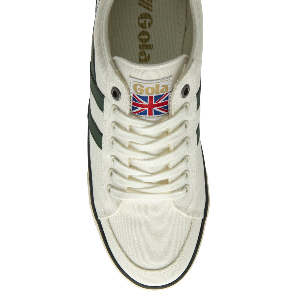 A white Gola sneaker with green stripes, viewed from directly above.