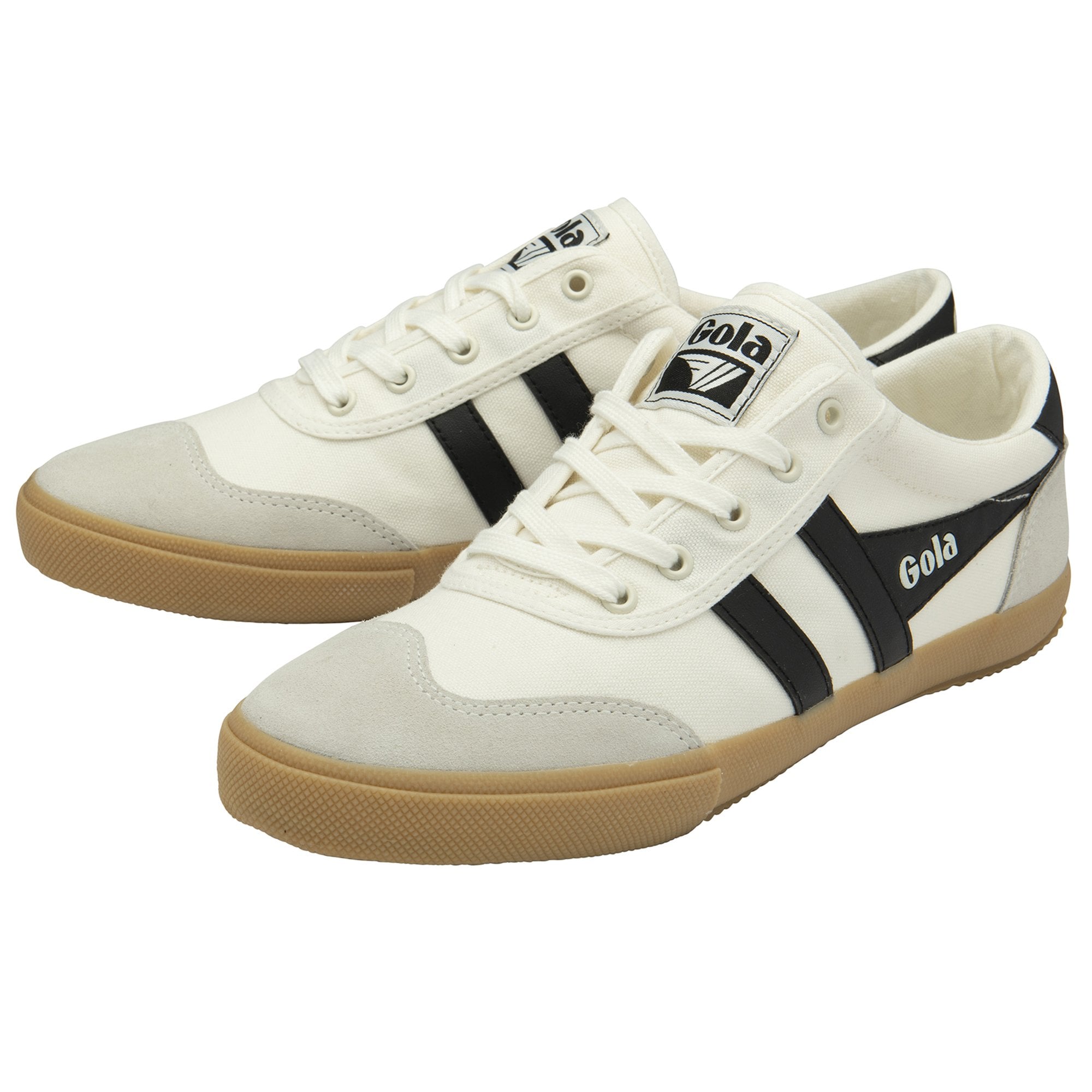 A pair of white Gola sneakers with black stripes and brown soles, angled from the side.