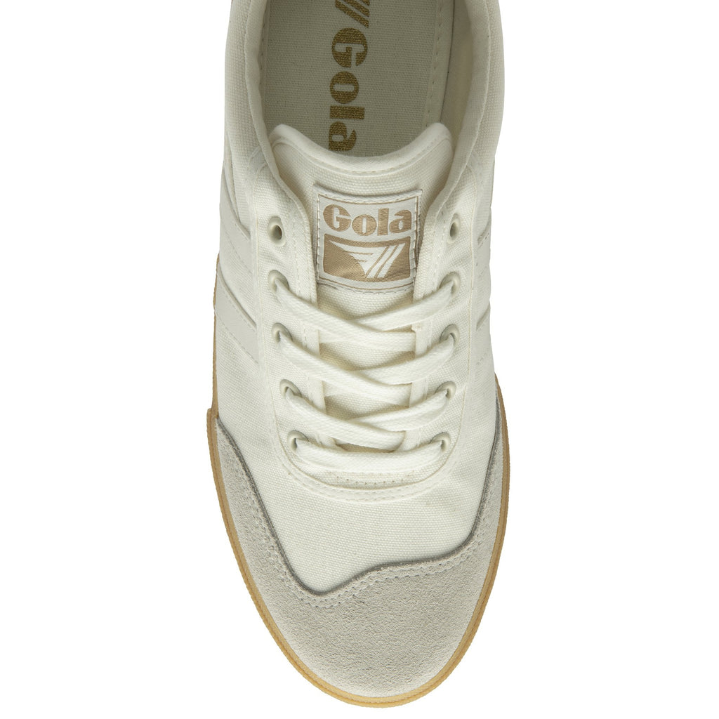 Top-down view of a single Gola Harrier Trainer in off-white, highlighting the laces and logo.