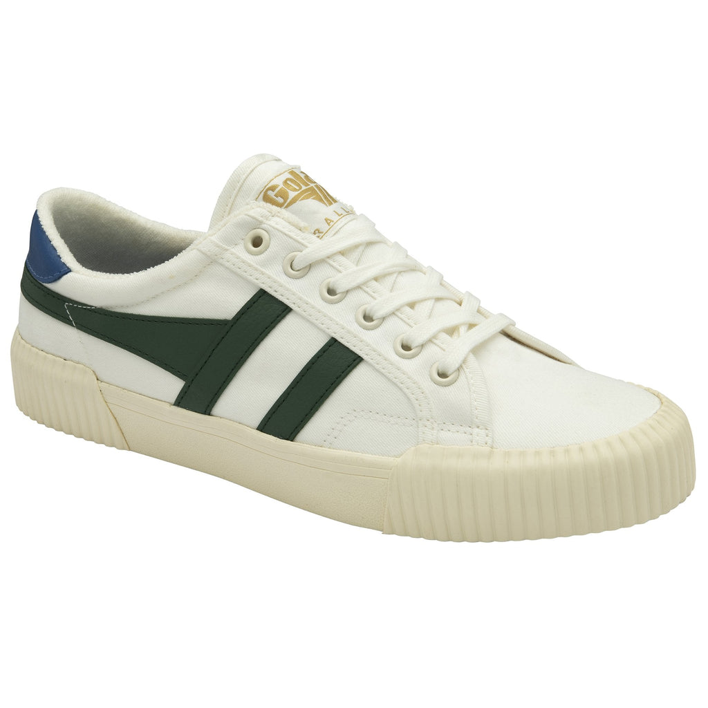 A white Gola trainer with green stripes, blue heel accent, and golden logo.