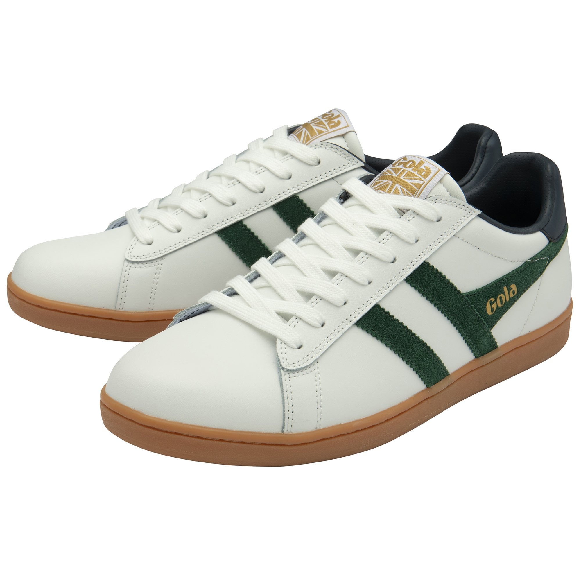A pair of white Gola trainers with green stripes and dark green heels.
