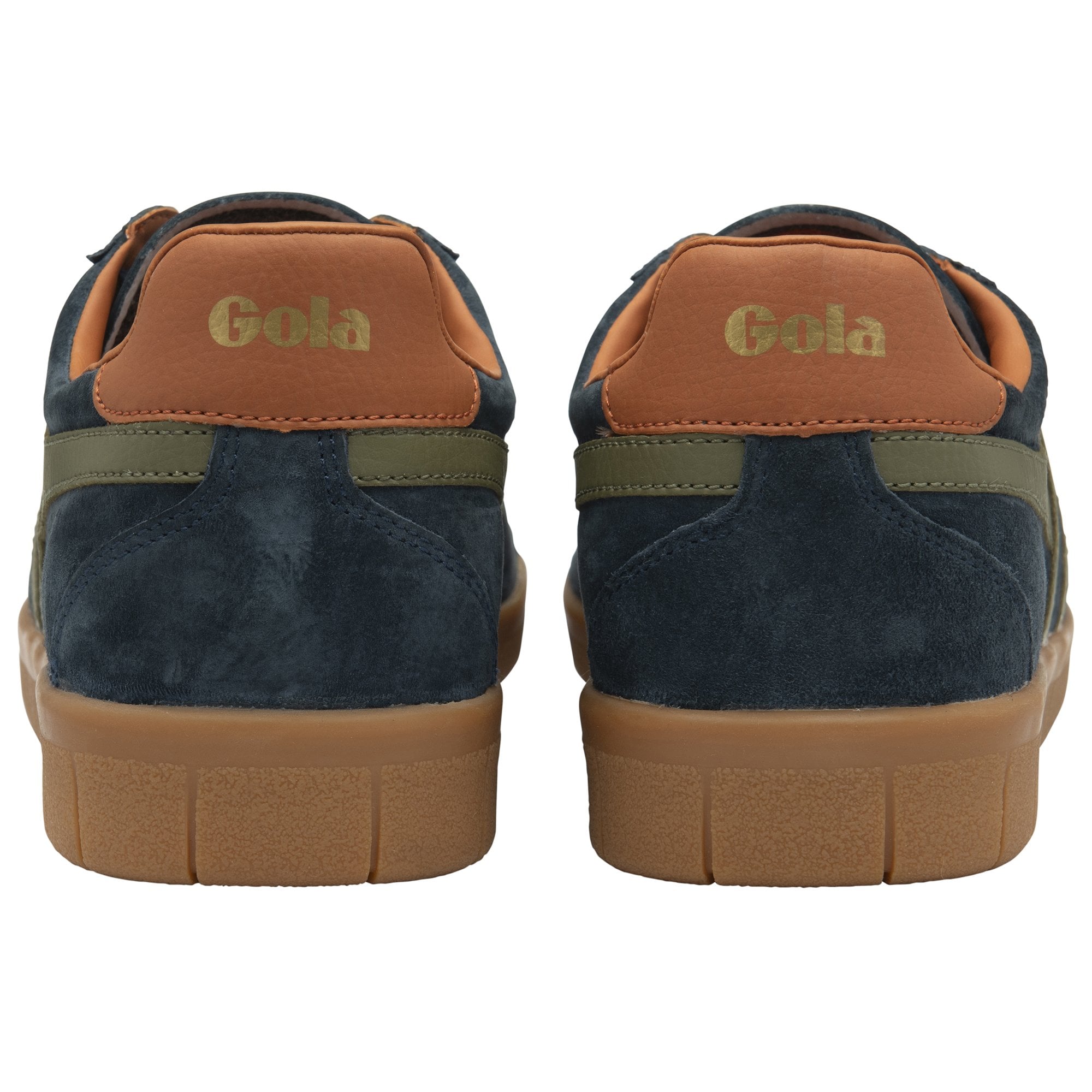 The back of two navy Gola trainers with brown heels.