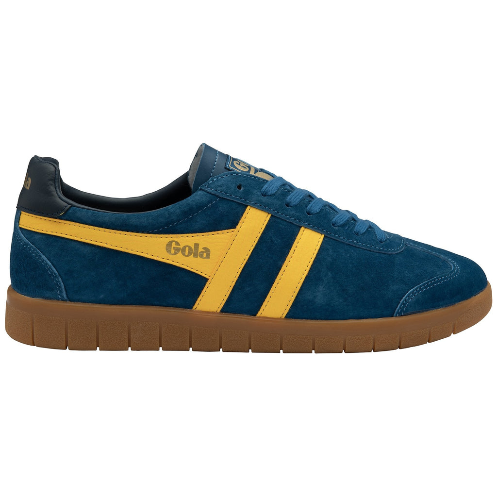 A single blue Gola trainer with yellow stripes and a brown sole is shown from the side.