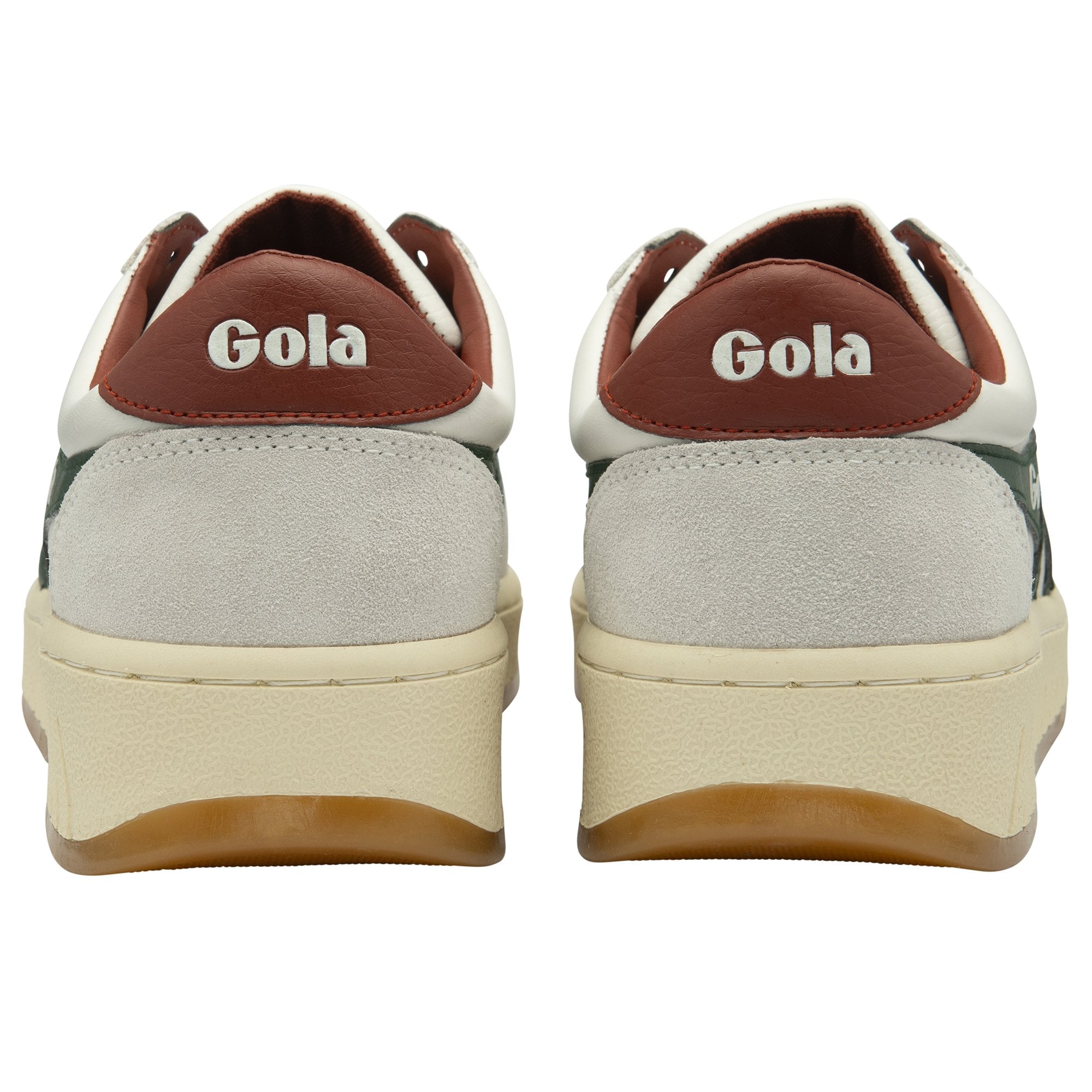 The back of two white and green Gola sneakers with brown heel tabs.