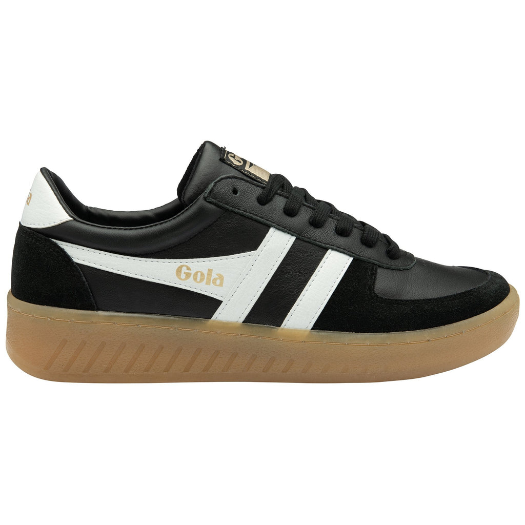 Black Gola sneaker with white stripes and a gum sole, viewed from the side.