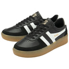 Pair of black Gola sneakers with white stripes and gum soles, angled together.