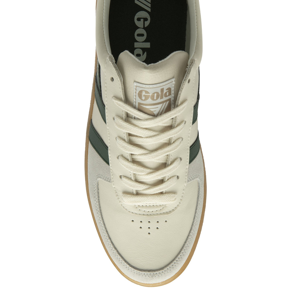 Top-down view of a white Gola sneaker with green stripes and brown sole.