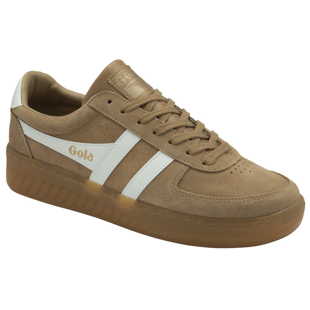 A men's trainer with a tan suede upper and subtle white accents.