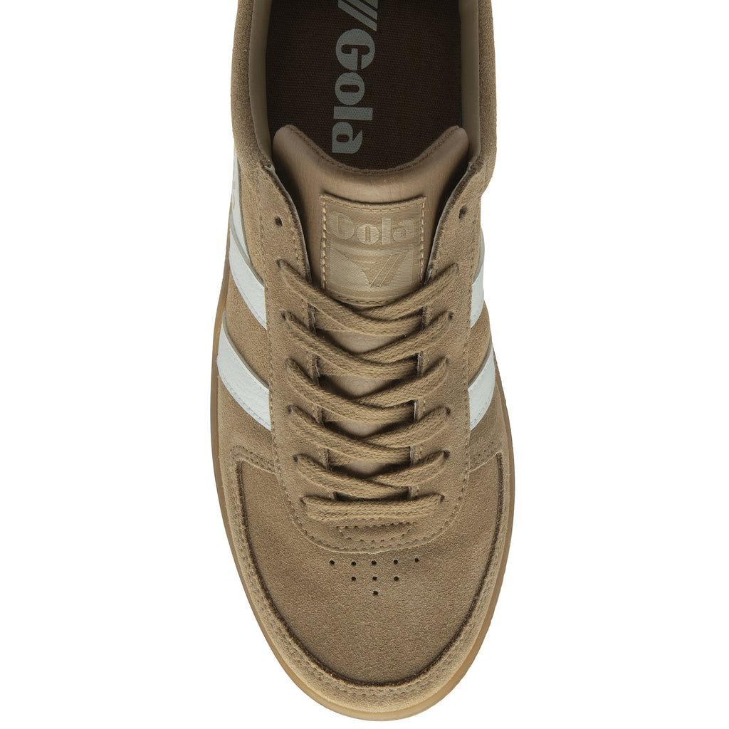 Top-down view of a men's trainer with tan suede and white accents.