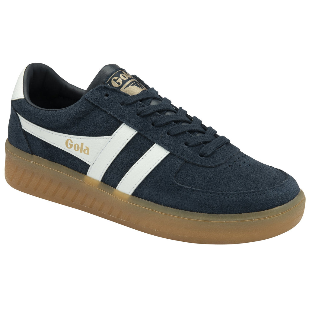 A men's trainer with a navy blue suede upper and subtle white accents.
