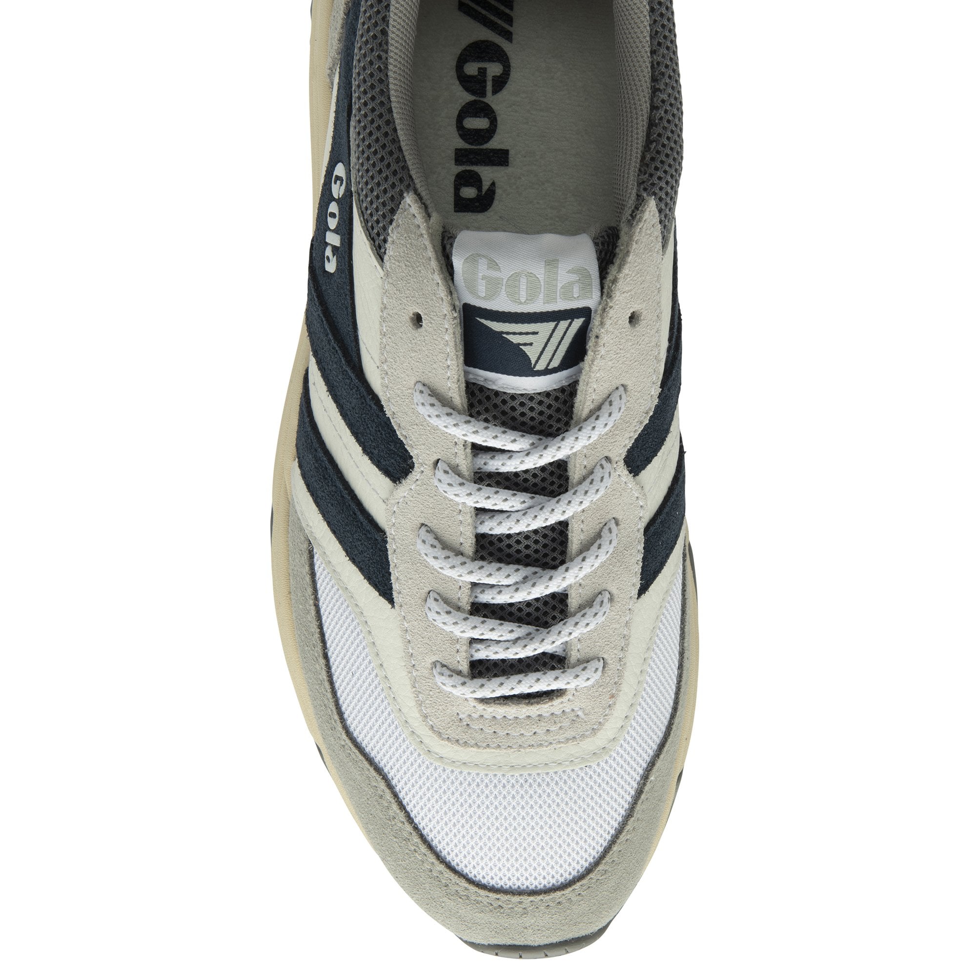 Top-down view of a men's trainer with white and navy blue accents.