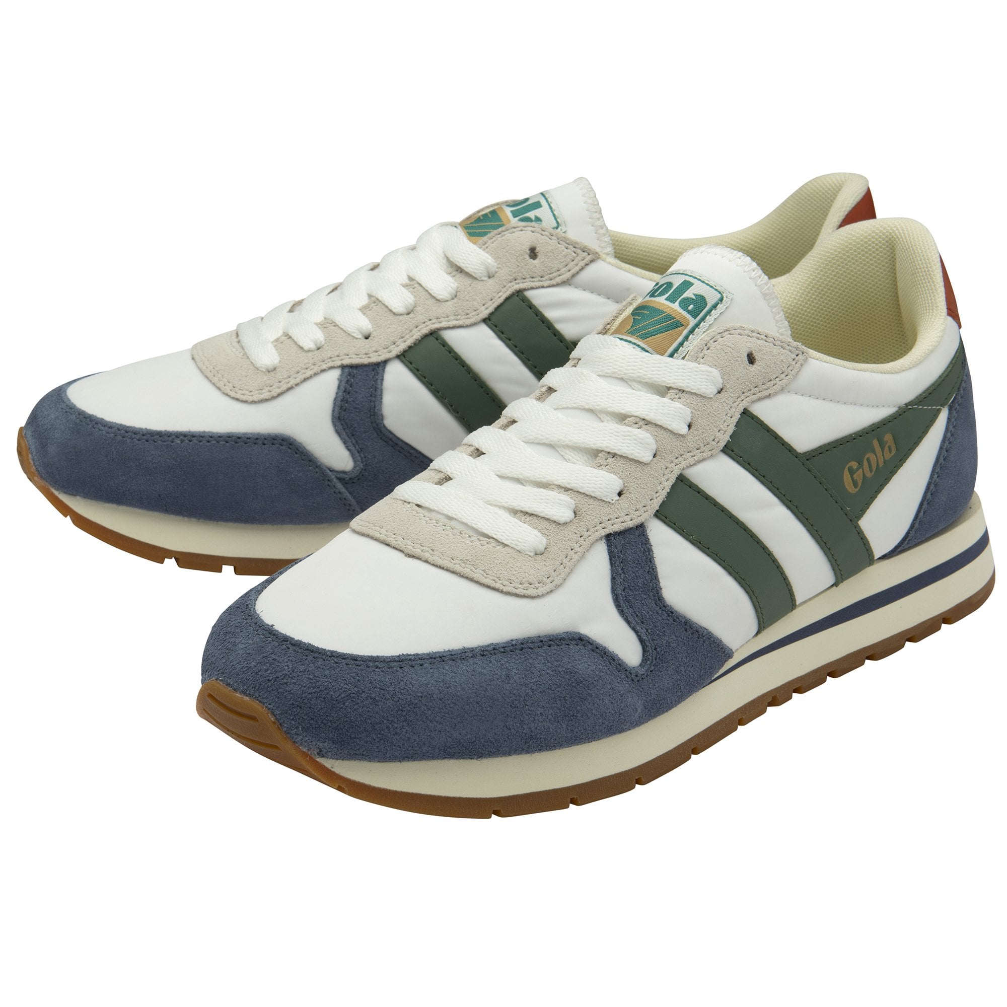 A pair of white and blue Gola sneakers with green stripes and brown soles, viewed at an angle.