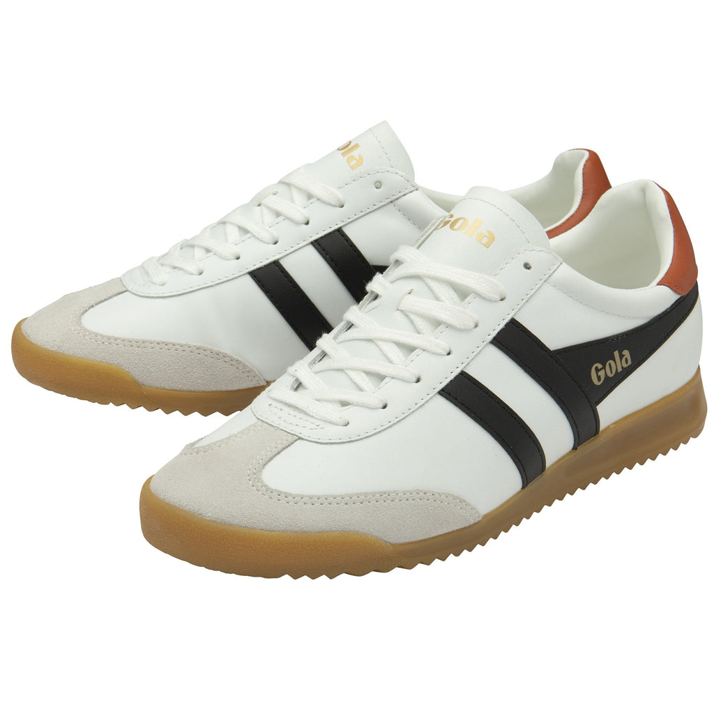 Pair of white Gola sneakers with black stripes, brown heels, and gum soles.