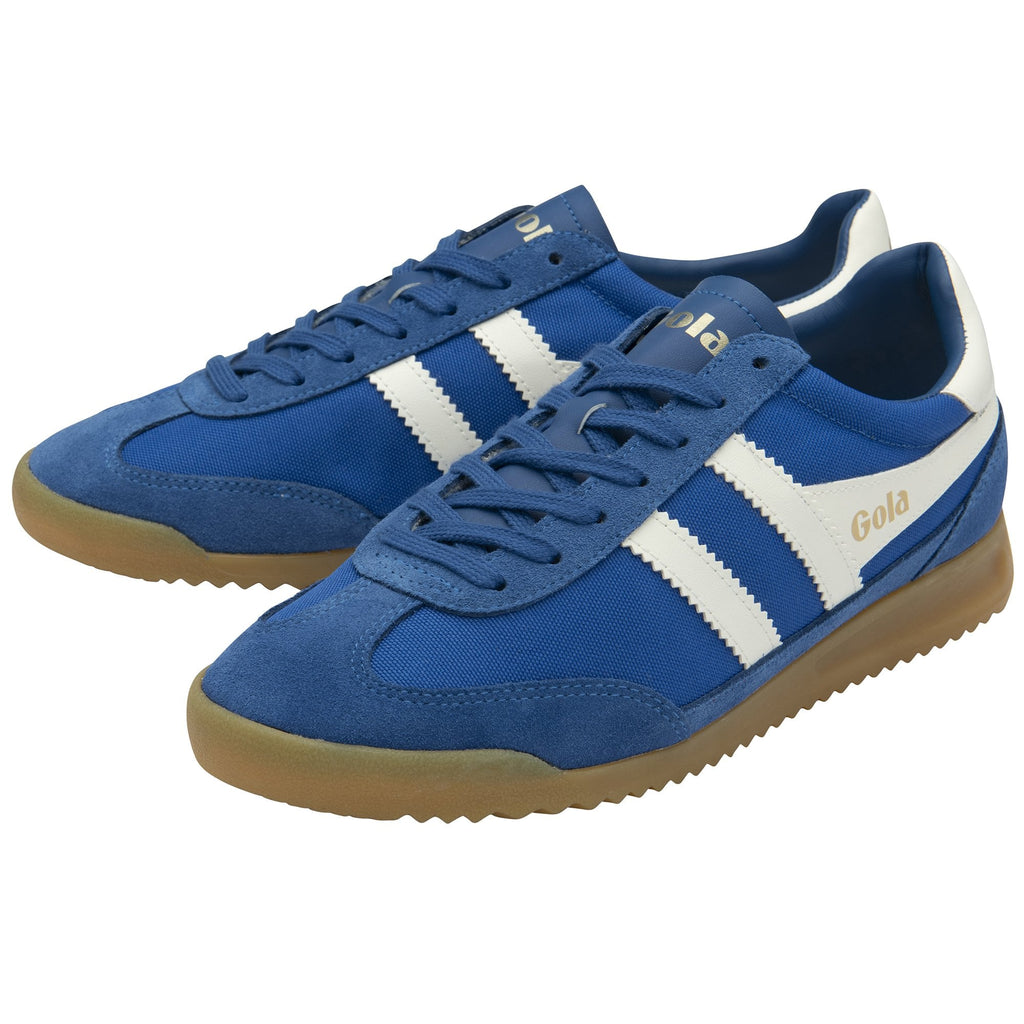 Pair of Gola Harrier sneakers in blue with white stripes and a gum sole.