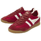 Pair of Gola Harrier trainers in red with white stripes and gum soles, angled for display.