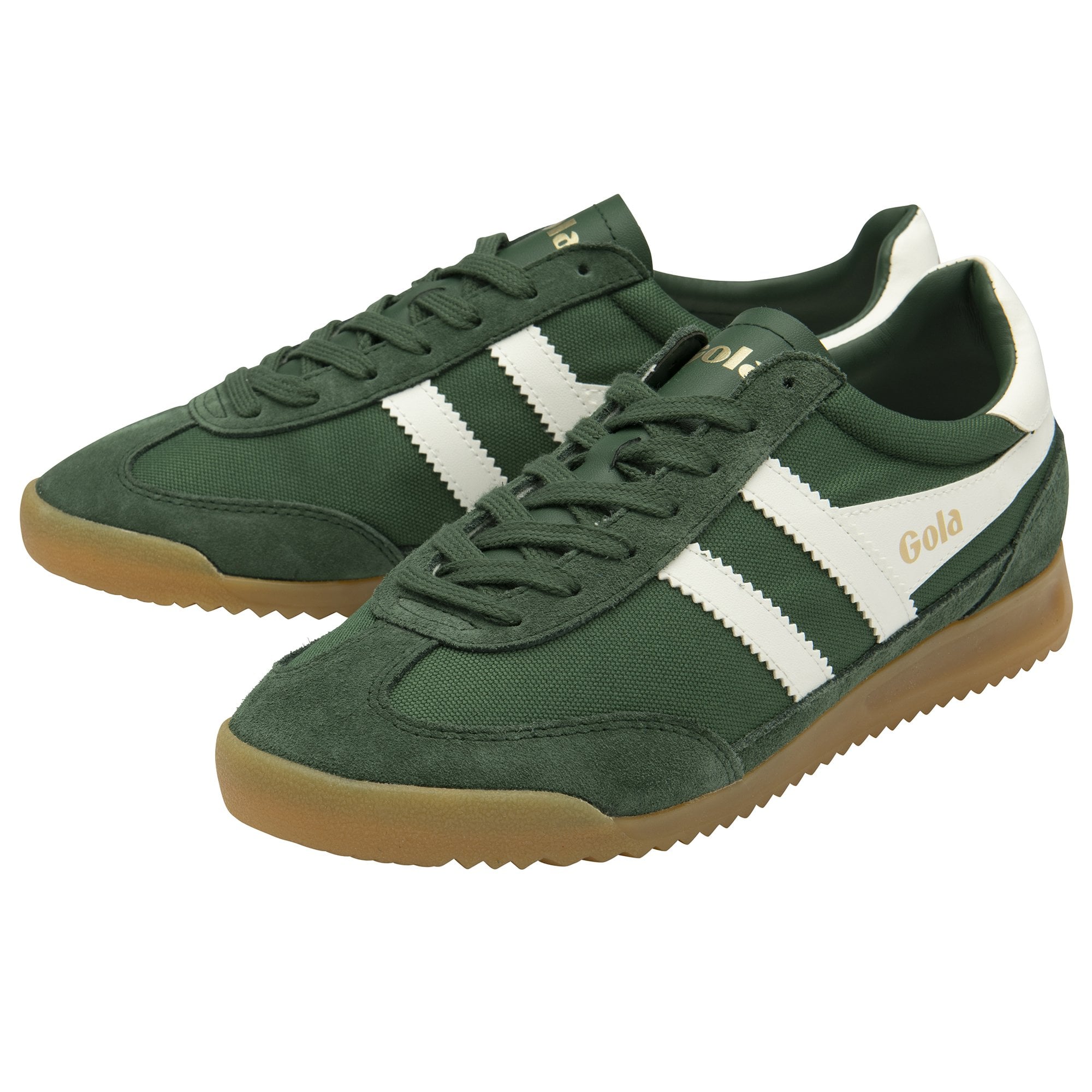 A pair of green and white Gola trainer shoes.
