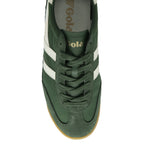 Top-down view of a single green and white Gola trainer.