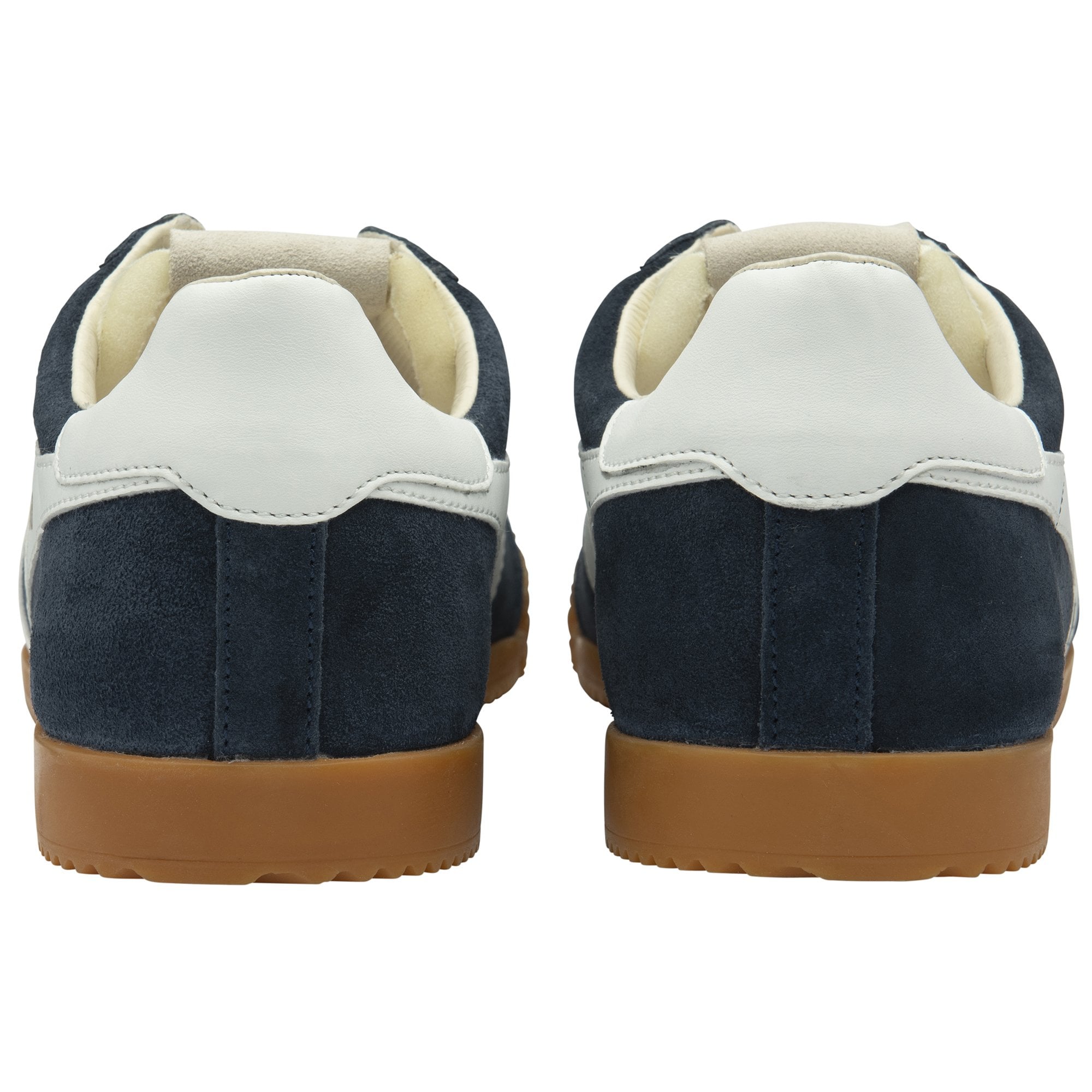 Back view of a pair of navy Gola sneakers with white heel accents and gum soles.