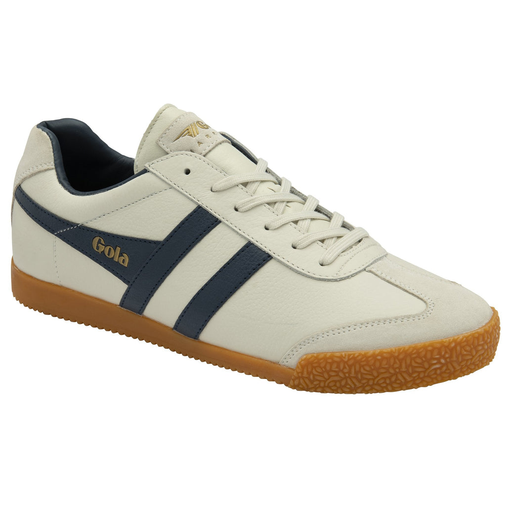 Side profile of a white and navy Gola sneaker with a gum sole, facing right.