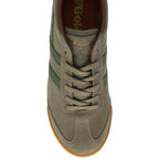 Top-down view of a single Gola Harrier suede sneaker in khaki and green.