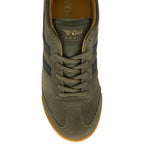 Top-down view of an olive green Gola Harrier shoe with black stripes and laces.