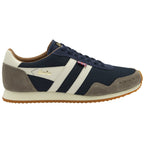 A single Gola Hurricane trainer in navy, off-white, and grey, viewed from the side.