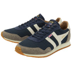 A pair of Gola Hurricane trainers in navy, off-white, and grey, positioned at an angle.