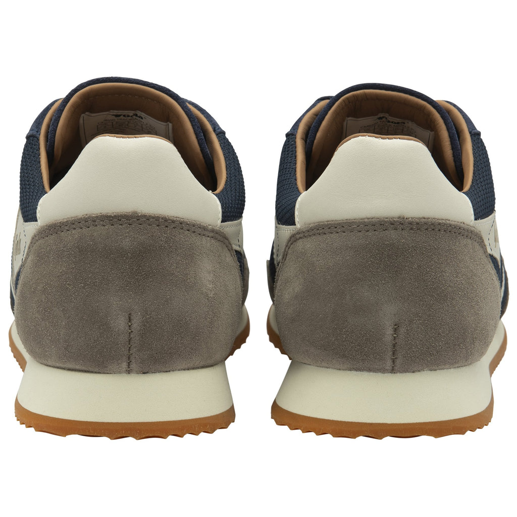 The rear view of a pair of Gola Hurricane trainers in navy, off-white, and grey.