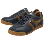 A pair of men's Gola Harrier trainers, navy leather with brown suede stripes, on a white background.