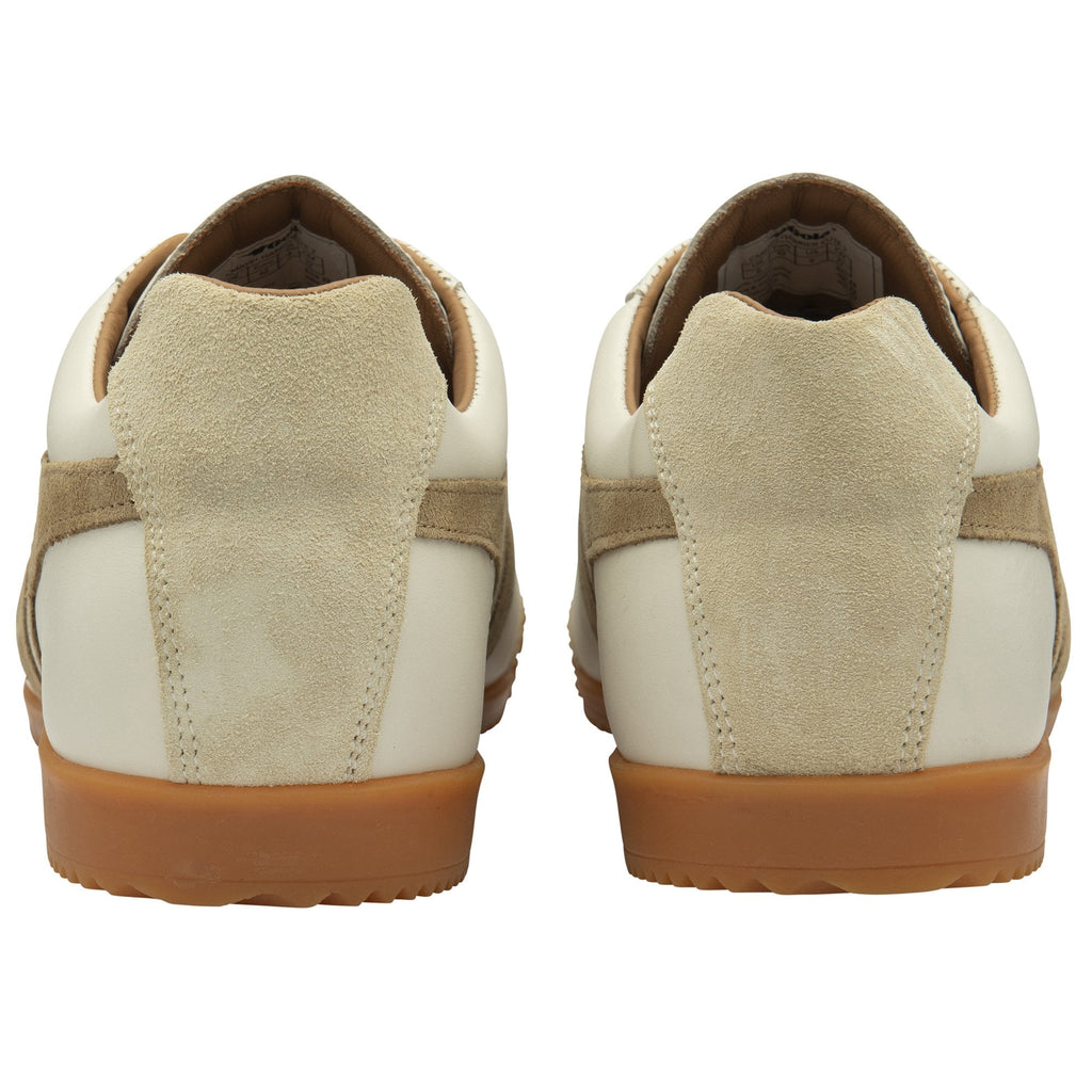 A pair of cream and tan Gola sneakers, back view.
