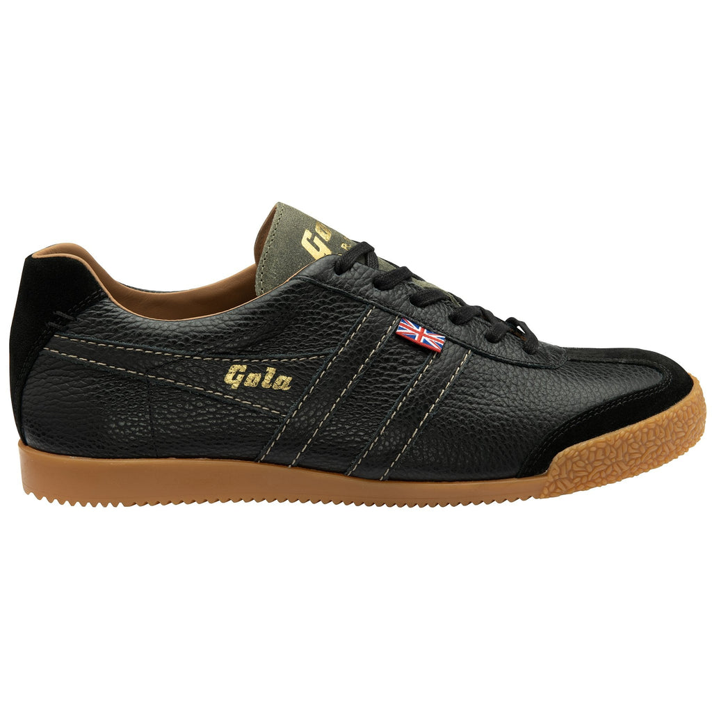 A single Gola low-top trainer in black with a gum sole, viewed from the right side.