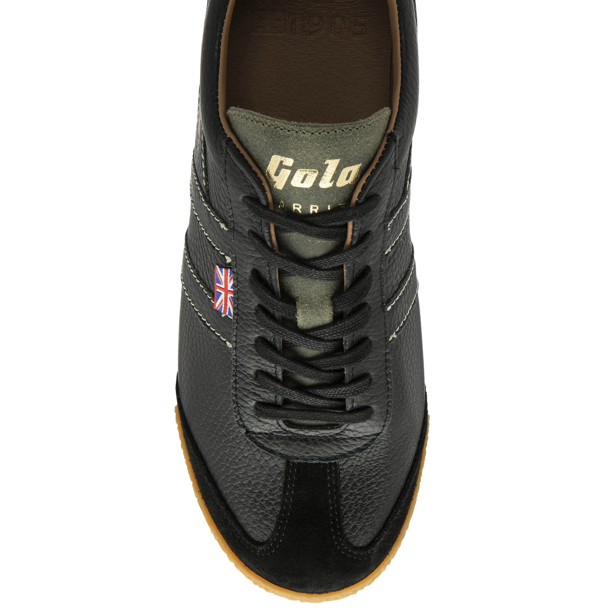A single Gola low-top trainer in black with a gum sole, viewed from directly above.