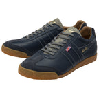 A pair of Gola men's Harrier 72 trainers in navy with a light gum sole and grey laces.