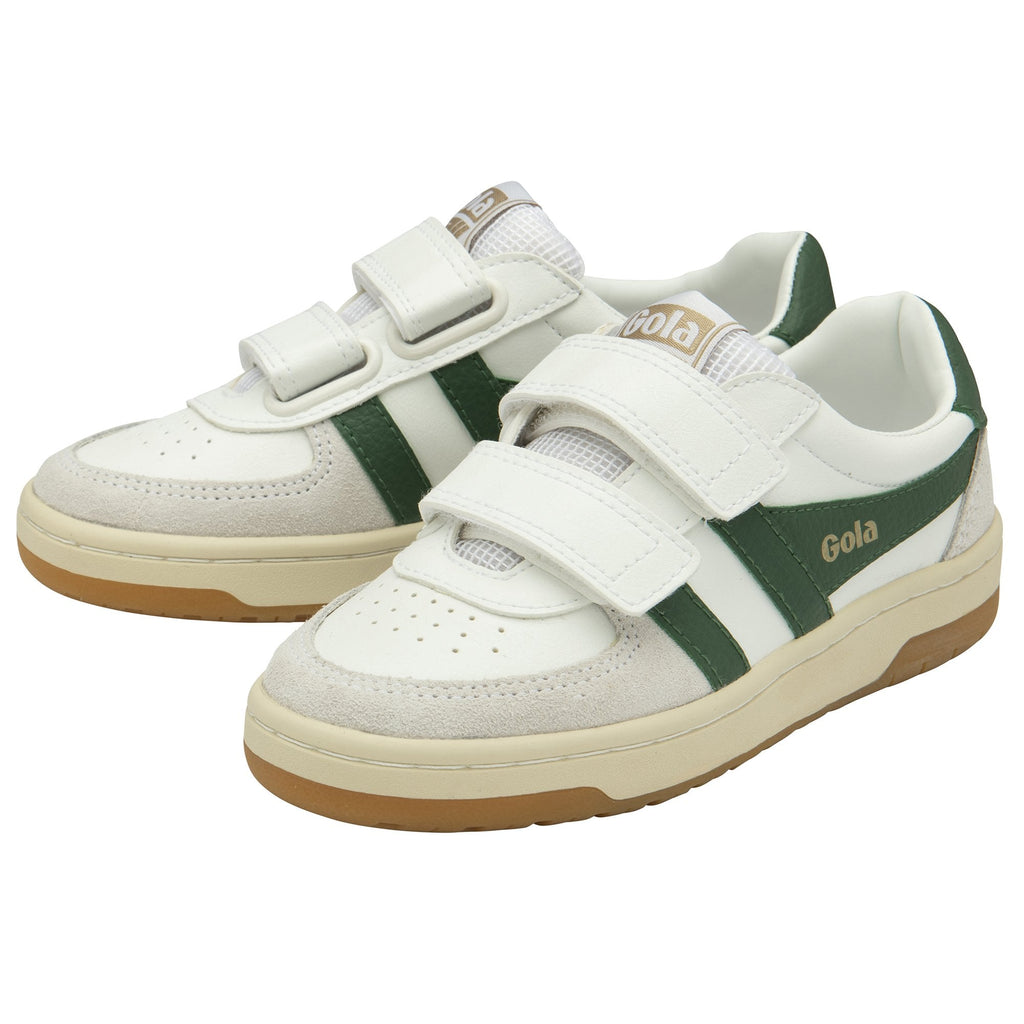 Two white Gola sneakers with green stripes, beige soles, and two white Velcro straps.